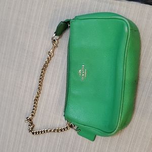 Coach wristlet with strap.